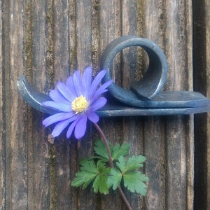 Forged snails, metal snails