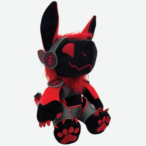 Puede incluir: Un peluche de un personaje negro y rojo con orejas grandes, una cara de estilo digital y una melena roja y esponjosa. El personaje lleva auriculares y tiene pies con forma de pata con huellas rojas. Diseño futurista.