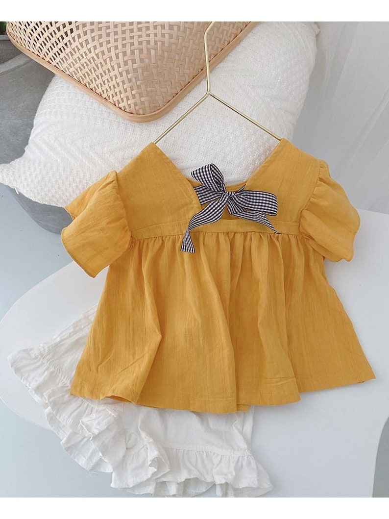2-Piece Little Girl Flutter Sleeve Yellow Top And White Shorts