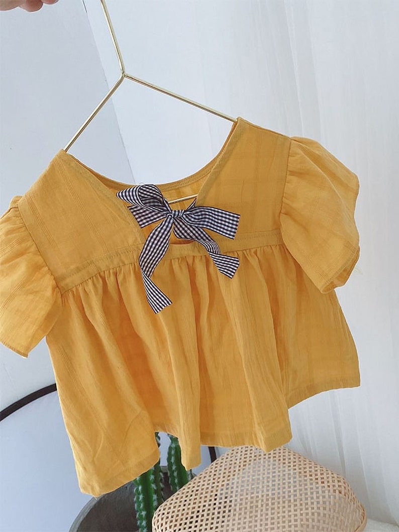 2-Piece Little Girl Flutter Sleeve Yellow Top And White Shorts