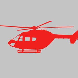 Könnte beinhalten: Eine rote Hubschrauber-Silhouette vor grauem Hintergrund.