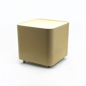 DIME Longato社製のM. Siardによる70年代の希少なテーブルコンテナ。ベージュのプラスチック製で、車輪付きのイタリアの宇宙時代デザイン。