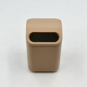 May include: A set of three ceramic mugs with a speckled, matte finish. The mugs are in shades of cream, light gray, and dark gray. Each mug has a simple, minimalist design and a rounded handle.