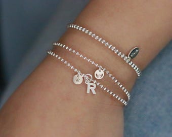 Pulsera de alas de ángel de plata de ley: un regalo minimalista con cuentas para el recuerdo.