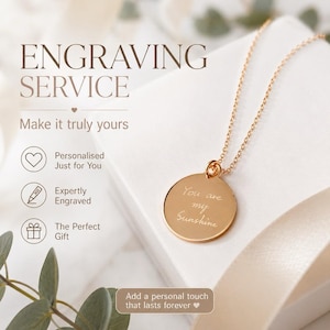 May include: A gold-toned circular pendant necklace featuring the engraved text 'You are my Sunshine'. The image includes text stating 'ENGRAVING SERVICE', 'Make it truly yours', 'Personalised Just for You', 'Expertly Engraved', and 'The Perfect Gift'.