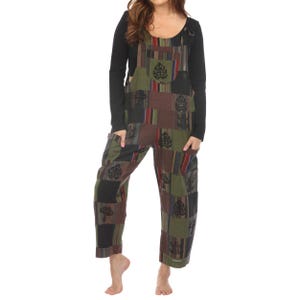 May include: A patchwork overall with a black, green, brown, and red color scheme. The overall has a leaf design and a wide leg.