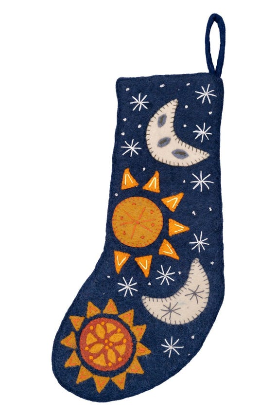 Felt Celestial Holiday Stockings,cosmic and moon cycle designs, boho Christmas decor, handcrafted sun and moon motifs, starry night theme