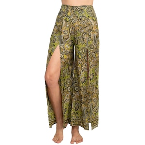 May include: Green and yellow paisley print wide-leg pants with high waist and side slits.