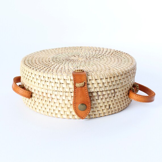 tan round woven purse
