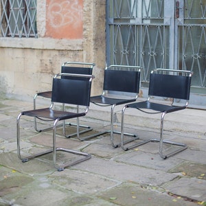 Set of 4 dining chairs in style of  B33 Marcel Breuer and Mart Stam Black Leather Tubular Cantilever Chairs Bauhaus