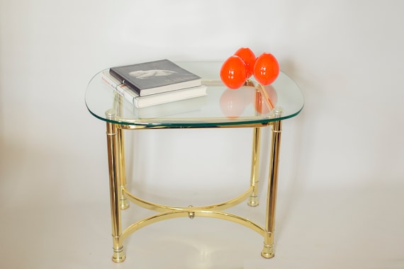 Gold table outlet with glass top