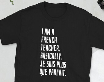 May include: Black t-shirt with white text that reads "I am a French teacher. Basically, je suis plus que parfait."