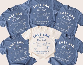 May include: A collection of blue and one white t-shirts with the text "LAST SAIL before the Veil" in white. The shirts have a graphic of a clothesline with lingerie and a cartoon character. The text "Sarah's Bachelorette Miami Beach, FL" is also present.