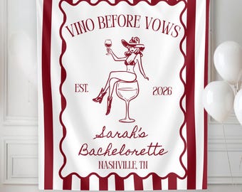 May include: A rectangular wall tapestry featuring a white background with vertical dark red stripes on the sides. The center displays the text VINO BEFORE VOWS, EST. 2026, Sarah's Bachelorette, and NASHVILLE, TN, with a graphic of a person in a cowboy hat.