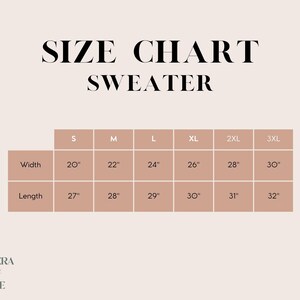 May include: A size chart for a sweater, with measurements in inches. The chart includes sizes S to 3XL, detailing width and length dimensions for each size. The background is a light beige color.
