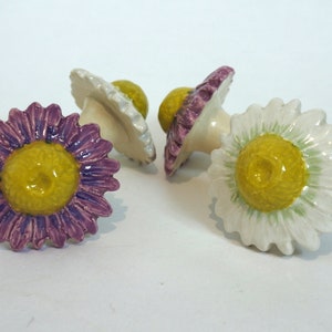 Handmade White or Viola daisy flower knobs, ideal for cupboards and drawers.