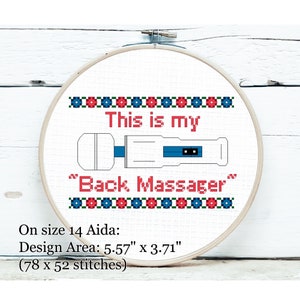 May include: A white embroidery hoop with a cross-stitch design that reads "This is my "Back Massager"". The design is in red, blue, and green thread. The hoop is 5.57 inches by 3.71 inches and has 78 by 52 stitches.