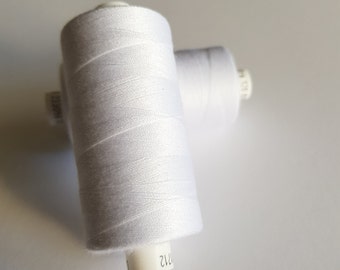 1 reel of sewing thread. 1000meters, white, coats brand