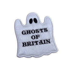 May include: White ghost-shaped patch with black embroidered text that reads "Ghosts of Britain".