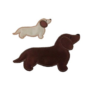 May include: Two embroidered dachshund dog patches. One is brown and the other is cream.