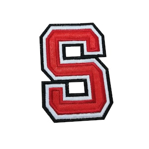 May include: Red felt letter S with white and black outlines. The letter is in a collegiate style font.