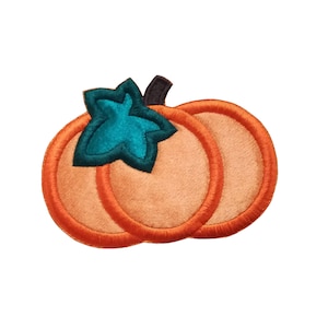 May include: Embroidered pumpkin patch with orange body, teal leaf, and brown stem. The pumpkin has a stitched outline and a soft, textured appearance. Ideal for autumn-themed crafts and decorations.