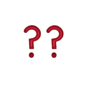 May include: Two red question marks with a single dot below each.