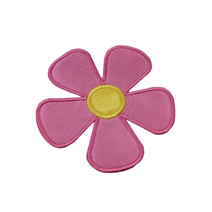 May include: A pink felt flower with a yellow centre. The flower has five petals and is a simple, whimsical design.