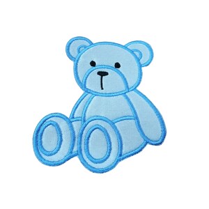 May include: A blue embroidered teddy bear applique patch. The bear is sitting with its legs crossed and has a simple, cartoon-like design.