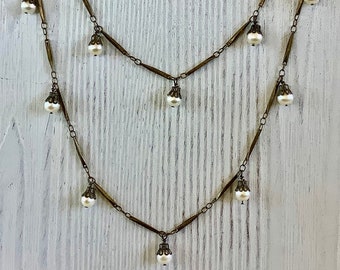 Double strand freshwater pearls & antique brass—25"--N198