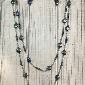 Peacock blue pearl coins, Swarovski crystals, Swarovski  pearls, silver-plated chain w/ matching earrings—June birthstone—48"--N143.