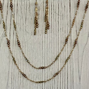 Swarovski crystals, Swarovski pearls, & gold plated chain w/ matching earrings—N384