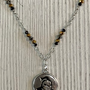 School charm/colors: Univ of Central Florida Knights--Swarovski crystals, Chinese crystals,  UCF Knights charm,  silver plated chain --N430