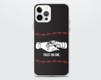 May include: Black phone case with a white image of a hand shaking a snake's hand. The image is surrounded by red barbed wire and the text "TRUST NO ONE." is below the image.