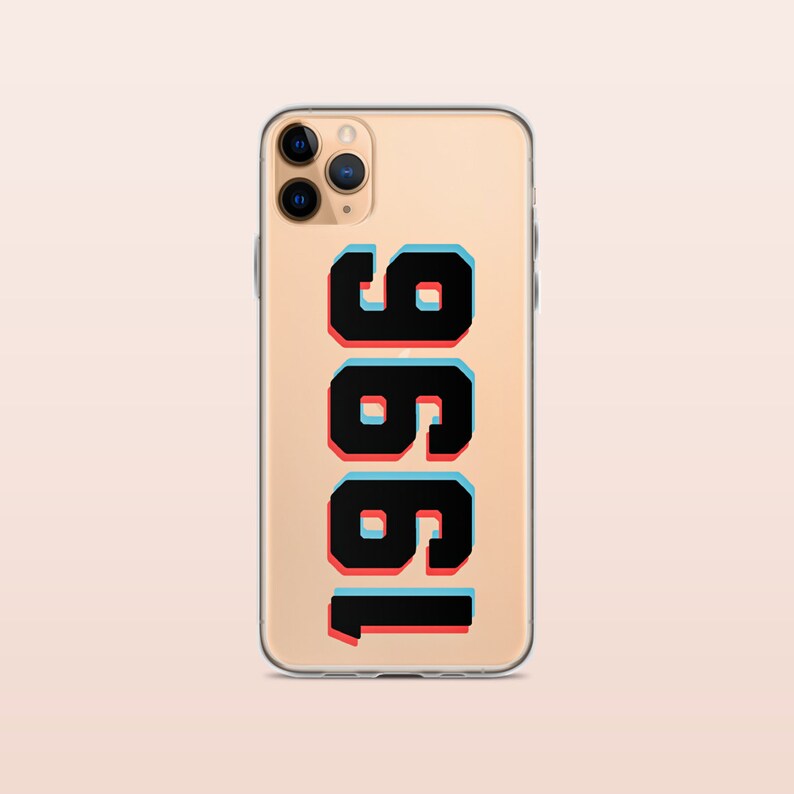 May include: A clear phone case with a gold background and a black 1981 graphic with a blue and red outline.