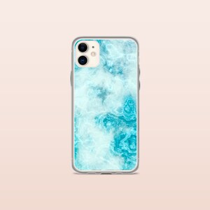 May include: A clear phone case with a blue and white marble design.