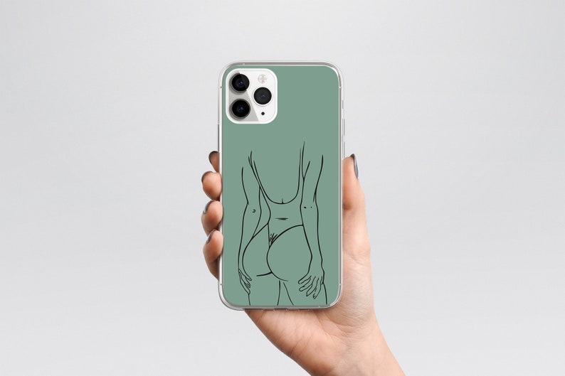 May include: A clear phone case with a sage green background and a black line drawing of a person in a swimsuit.