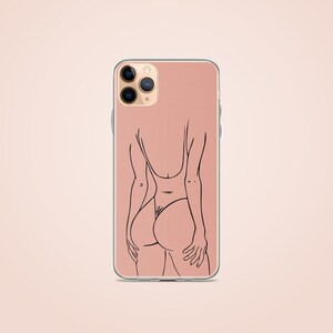 May include: A pink iPhone case with a black line drawing of a person in a swimsuit.