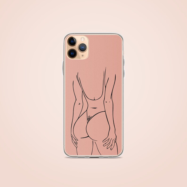 May include: A pink iPhone case with a black line drawing of a person in a swimsuit.