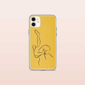 May include: A clear phone case with a yellow background and a black line drawing of two figures embracing.