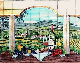 Tile mural.Handmade landscape, still life of Tuscany, whit grapes, cheese, wine, bread, bottle of wine. Tradicional ceramic, clasic tile