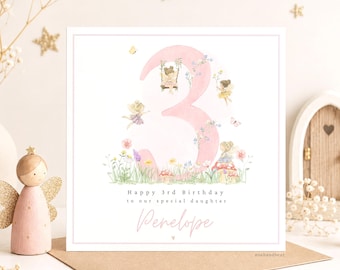 May include: A square birthday greeting card featuring a large pink number three decorated with watercolor illustrations of fairies, flowers, and butterflies. The text reads Happy 3rd Birthday to our special daughter and the name Penelope.