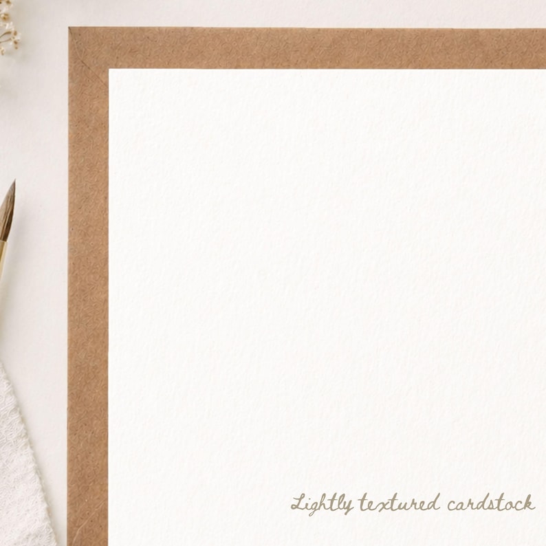 May include: A rectangular white card with a subtle textured surface, framed by a thick brown kraft paper border. The bottom right corner features the text Lightly textured cardstock in a small, elegant, brown cursive script font.