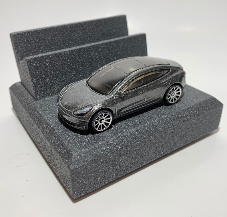 unique automotive art for your desk office or man cave A great gift for the electric car enthusiast! Tesla Smart Phone Stand