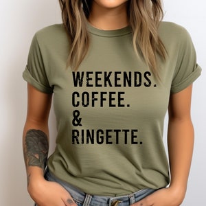 May include: A green t-shirt with the text "Weekends. Coffee. & Ringette." printed in black.