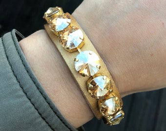 Gold Swarovski crystal on metallic gold leather cuff