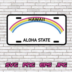 May include: A white license plate with a black border, featuring the word "HAWAII" above a rainbow arc and "ALOHA STATE" below. The background is a brick wall.