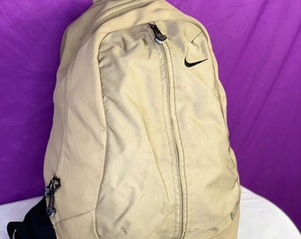 gold nike backpack