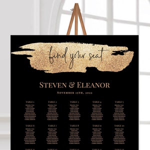 Peut inclure: Plan de table de mariage noir avec des accents de paillettes dorées. Le tableau comporte le texte "find your seat" et "STEVEN & ELEANOR" avec la date "NOVEMBER 15TH, 2012". Le tableau liste les numéros de table et les noms des invités.
