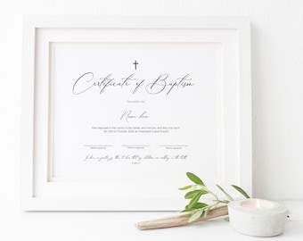 May include: A white framed certificate of baptism with black text. The certificate reads "Certificate of Baptism" and "Name here" with a cross at the top.